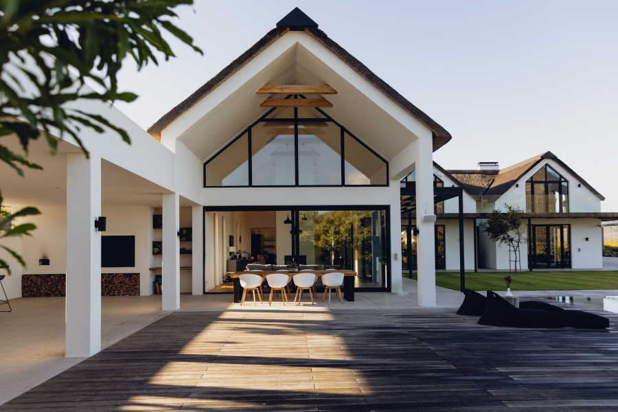 Luxury modern house with large glass windows and sleek architectural design